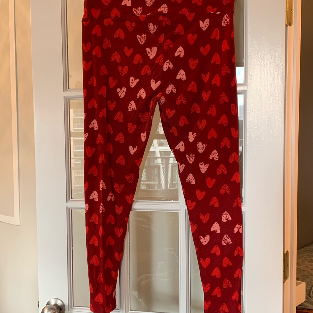 Two pairs LulaRoe Tall and Curvy red heart leggings
